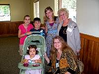 Delores Rhoney Ayers (59) and daughter Marcella and 4 grandchildren.jpg